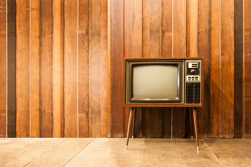Old vintage television or tv in room