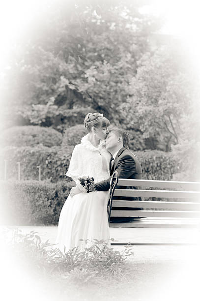 istock bride and groom in the park, a wedding bouquet, 482034005