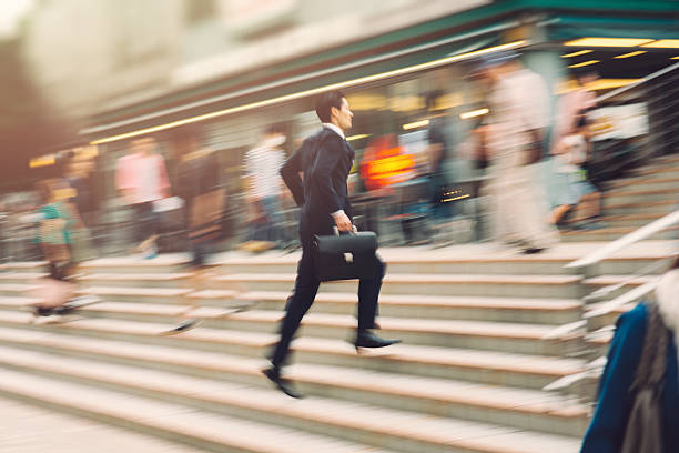 Businessman running on the street