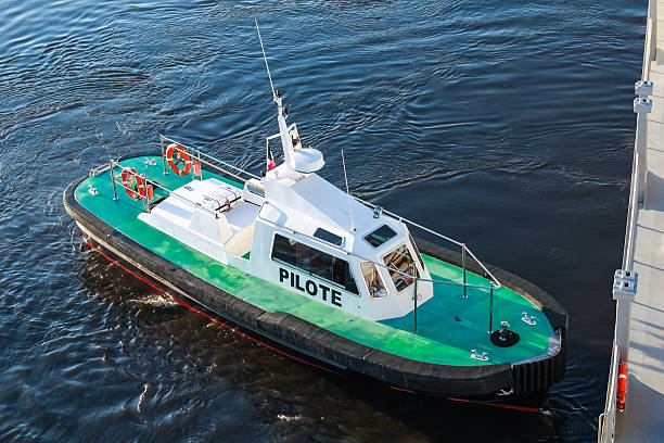 istock Small pilot boat with green deck and black hull 482039630
