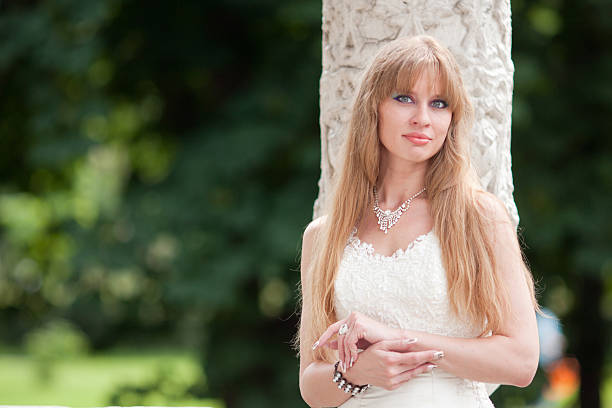 istock woman near the column 482043169