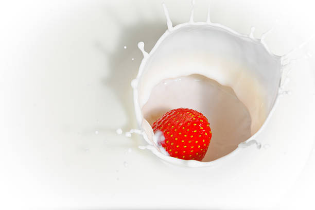 istock The strawberry falling in milk 482043690