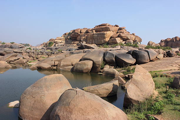 istock Tungabhadra river flowing across the hills in Hampi 482044165
