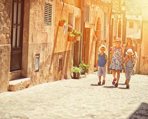 istock Family visiting mediterranean town of Valldemossa 482044444