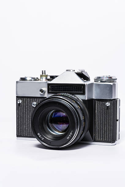 istock Old Fashioned Vintage 35mm Film Camera With White Background. 482044504