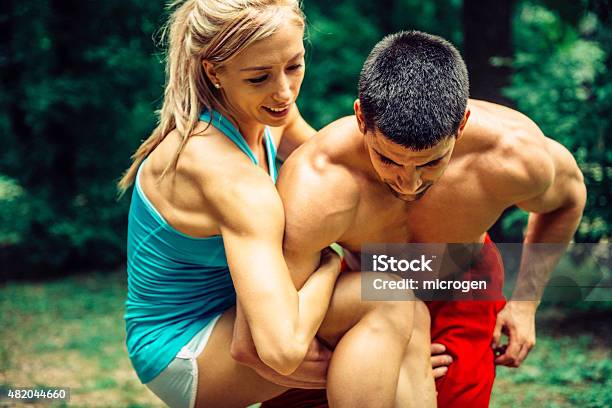 Gym Couple Workout Stock Photo - Download Image Now - 2015, Adult, Adults Only