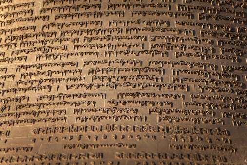 Nepali scriptures details from a buddhist bell in Kathmandu.