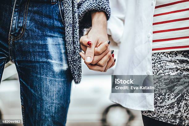 Hand In Hand Stock Photo - Download Image Now - Holding Hands, Dating, Teenager