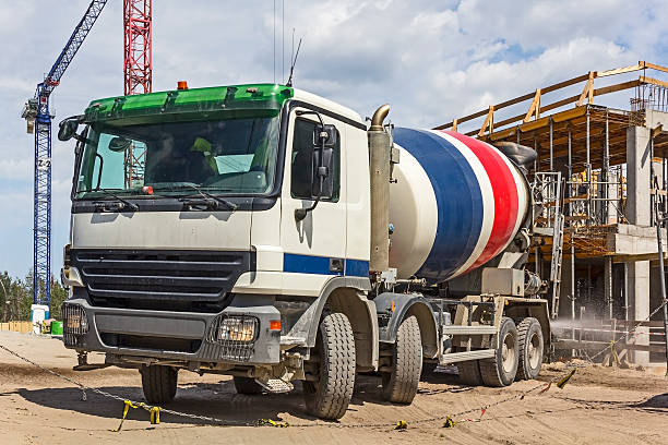 istock Concrete mixer truck in construction site 482044994
