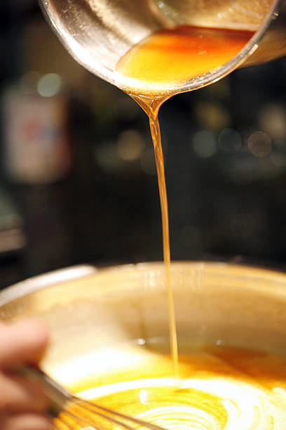 istock Pouring Melted Butter in to the mixture 482048172