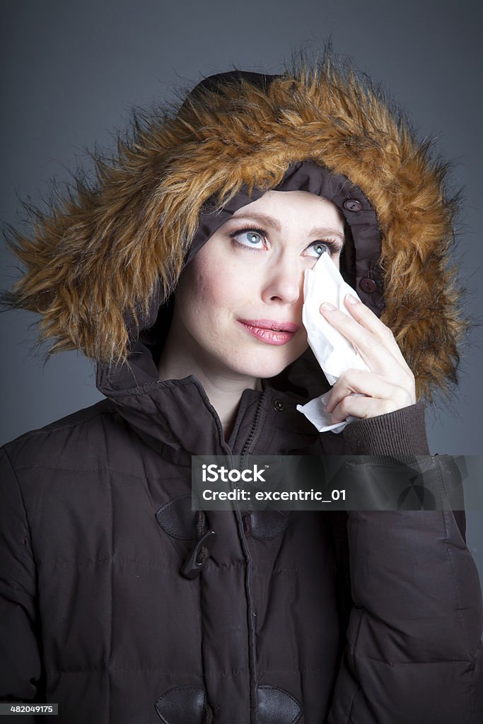 Attractive woman isolated on grey background 20-29 Years Stock Photo