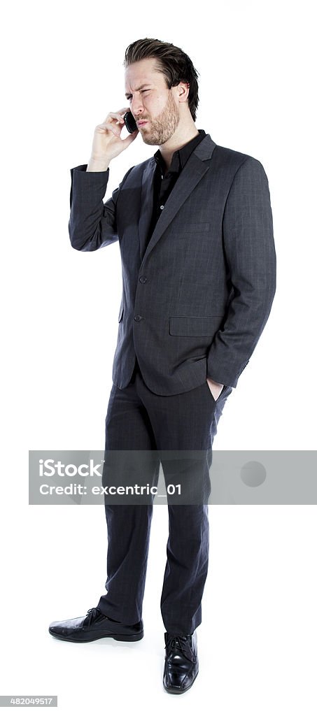 Бизнес человек носит серый костюм на белом фоне - Стоковые фото 30-39 лет роялти-фри