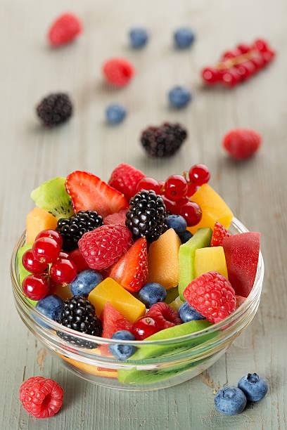 istock fruit salad in a glass bowl 482049550