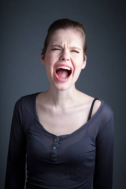 istock Attractive woman isolated on grey background 482050223