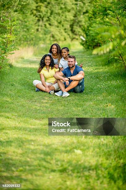 Family At The Park Stock Photo - Download Image Now - Multiracial Group, Nature, 2015