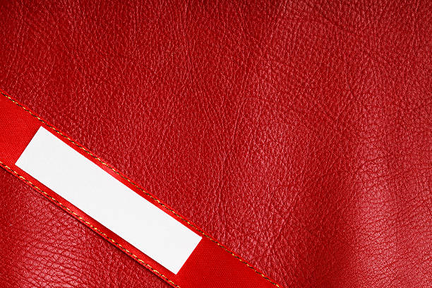 istock Piece scrap paper blank copy space on red leather background 482062295