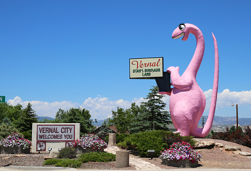 Vernal, Utah, USA - June 17, 2015: A pink dinosaur statue welcomes tourists to Venal City – Utah's Dinosaur land.