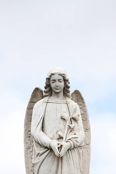 istock Statue of angel against sky with copy space 482067303
