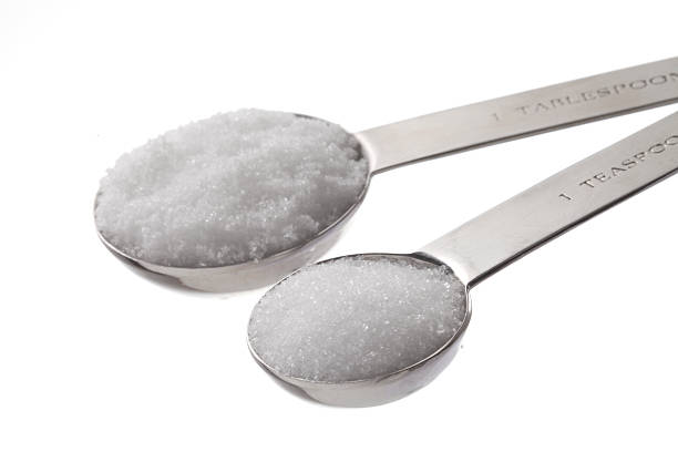 salz und zucker - sugar kitchen utensil measuring spoon spoon stock-fotos und bilder