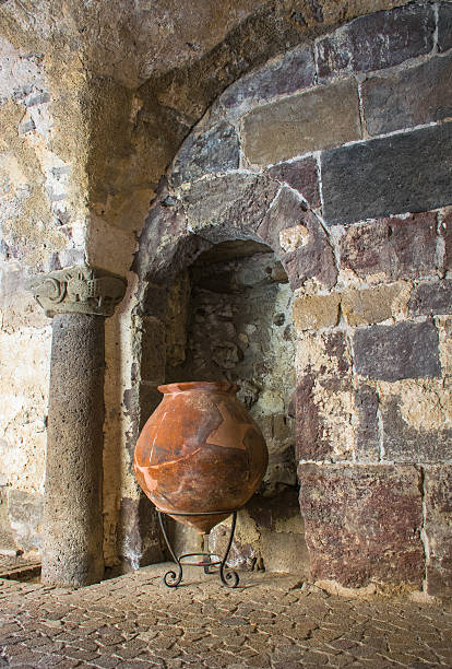istock big amphora in front of old stone wall 482071370
