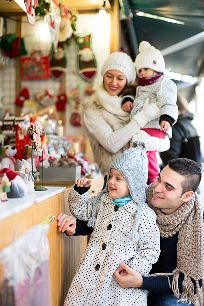 istock Couple shopping for christmas decorations. 482074094