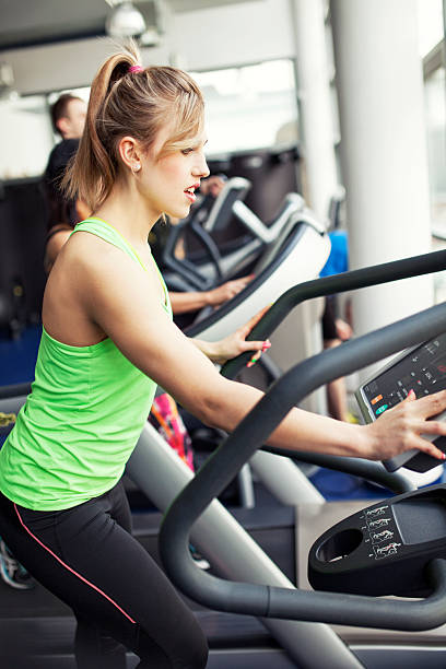istock Woman Running On Treadmill 482074161