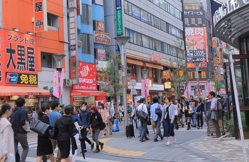 Tokyo Japan - May 9, 2015: People visit busy Sunshine street shopping district in Ikebukuro Tokyo Japan.