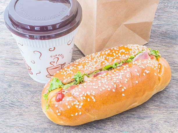 istock take away coffee cup and hot dog 482079902