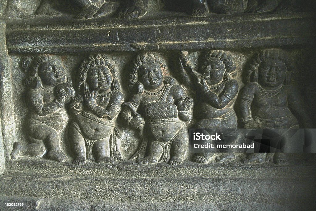 Five Musicians Wall panel carving of musicians with various instruments, Badami, Karnataka, India, Asia Architecture Stock Photo