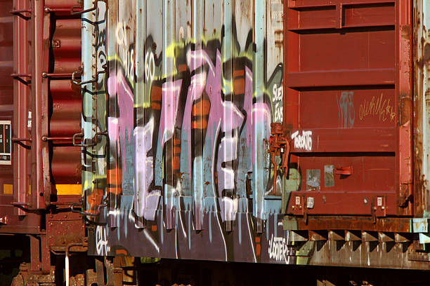 istock Grafetti painted on parked boxcar 482083515