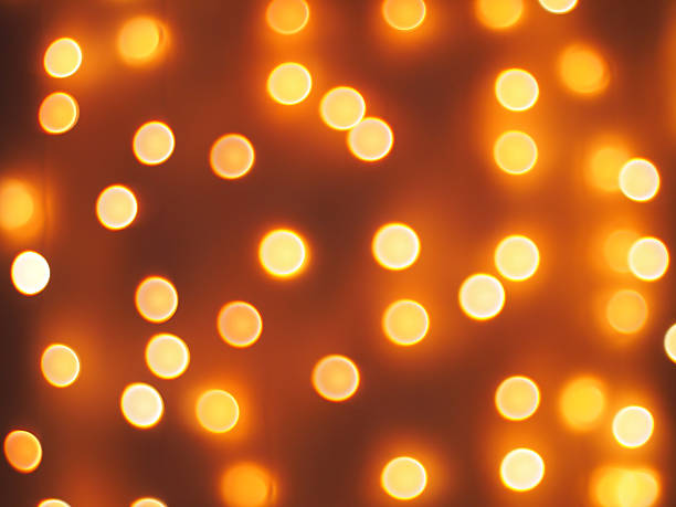 istock Abstract defocused and blur small yellow lights 482084392
