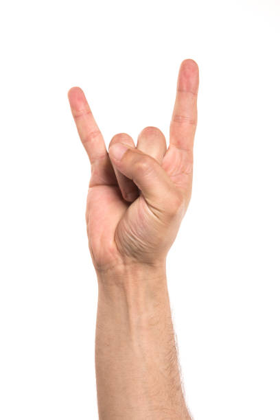 uomo in polsino & la rock roll simbolo della mano - hand sign foto e immagini stock