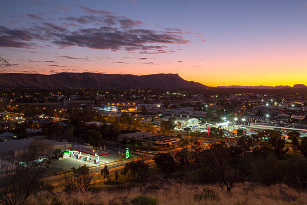 View over Alice Springs View from Anzac Hill on a fine winter's evening in Alice Springs, Northern Territory, Australia alice springs photos stock pictures, royalty-free photos & images