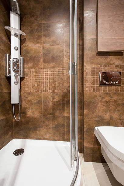 istock Brown tiles in bathroom interior 482095092