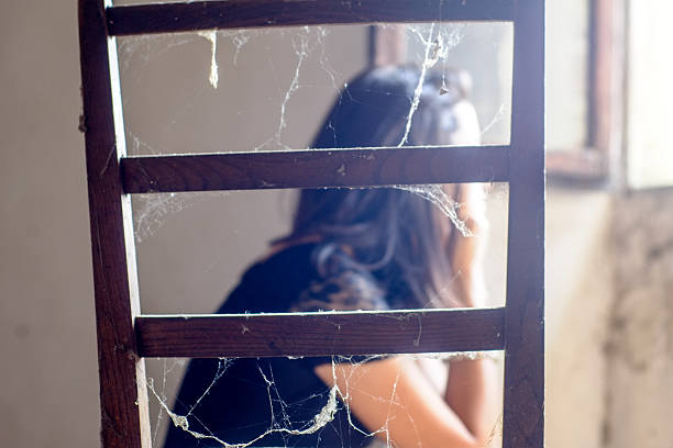 istock Young teen looking through an old chair 482099498
