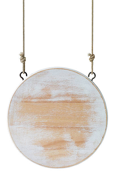 istock Round wood sign board hanging from old rope 482099874