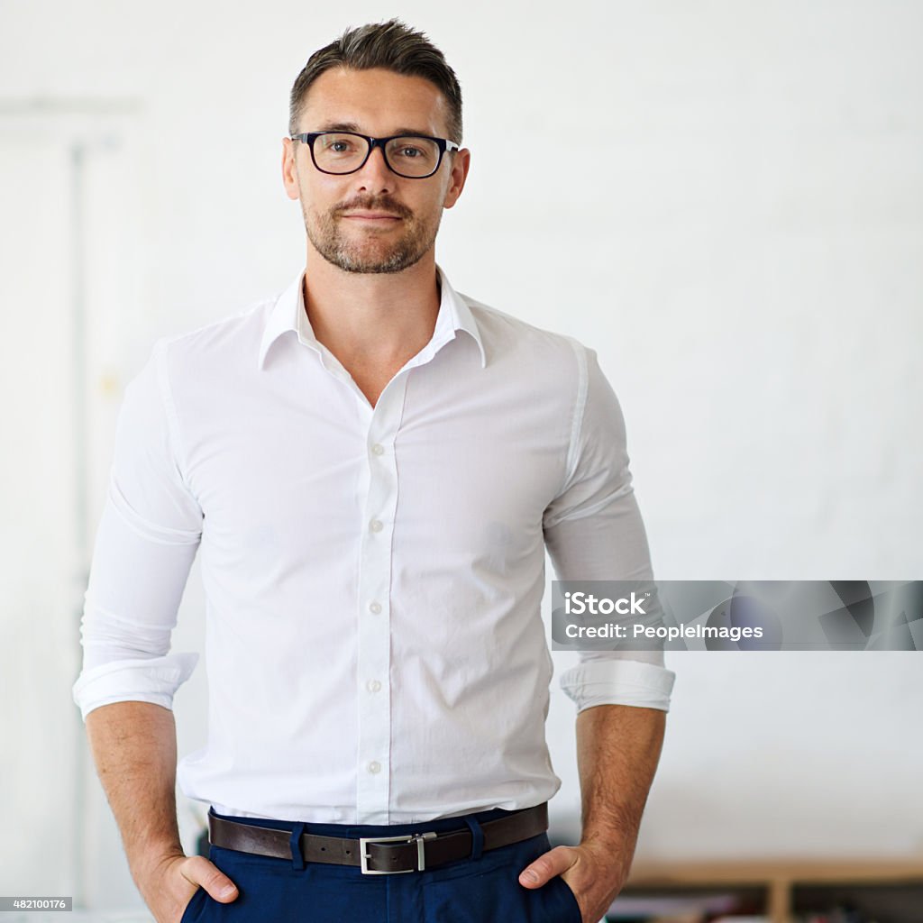 Confident in his business ability Cropped portrait of a businessman standing with his hands in his pockets in the officehttp://195.154.178.81/DATA/i_collage/pi/shoots/805350.jpg Men Stock Photo