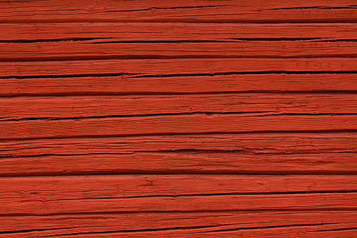 Old country house red painted wall in traditional swedish red color.