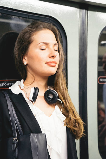 istock Beautiful Woman On Subway Train 482100836