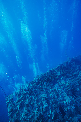 Wreck diving at a shipwreck. Red Sea, reef. Scuba Diver Point of View.