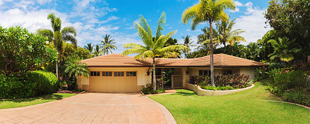 istock Exterior View of Luxury Home, Front Lawn and Driveway 482101744