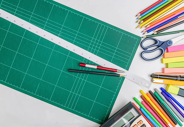istock School and office supplies frame, on white background 482102008