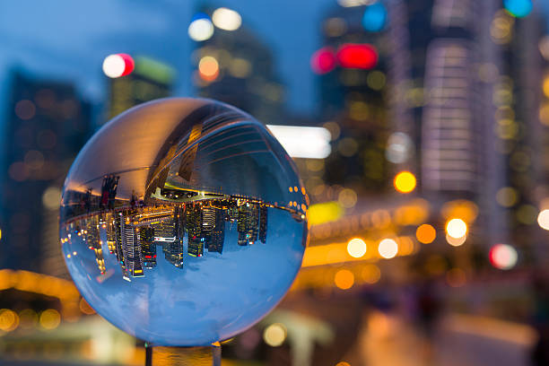 istock Crystal Ball with Reflection of Singapore CBD Skyline 482111106