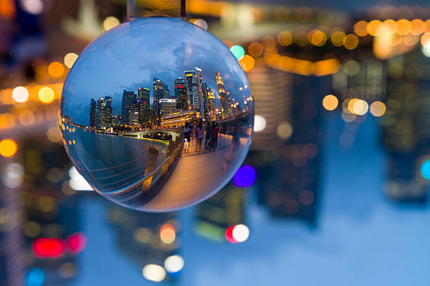 istock Crystal Ball with Reflection of Singapore CBD Skyline 482111114