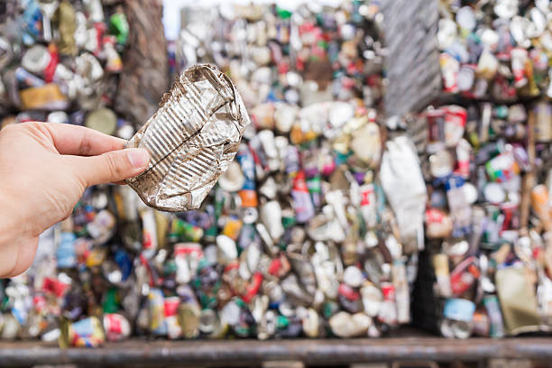 istock Hand holding aluminum can for recycle 482111598