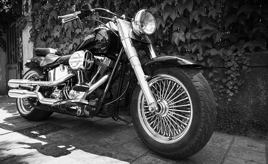 Ajaccio, France - July 6, 2015:  Black Harley Davidson motorcycle with chromed details stands parked