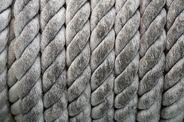 istock old roll of rope used in the ship holding 482118520