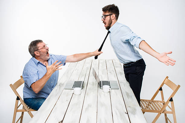 istock Business conflict. The two men expressing negativity while one man 482119162