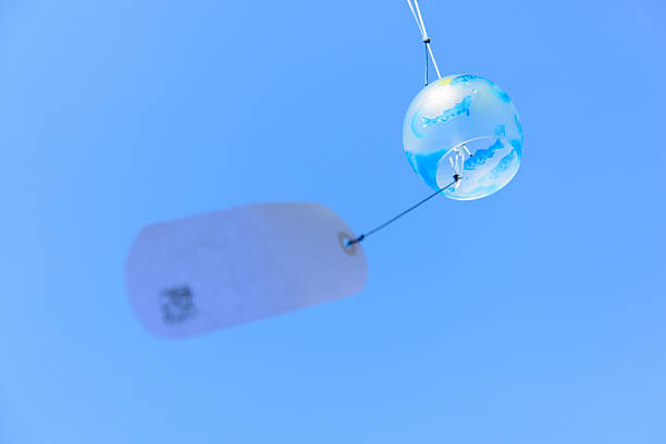 istock Japanese wind chime against blue sky 482119324