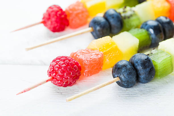 istock Fresh summer fruits on sticks 482120002